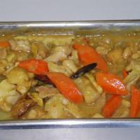 Curry Chicken · Chicken with yellow curry sauce with carrots and potatoes.