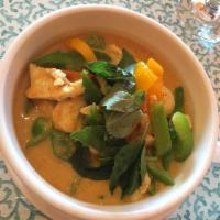 Panang Curry · Thai Panang curry paste with coconut milk, bell pepper, lime leaves, and basil leaves. Serve...