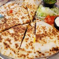 Quesadillas · 2 flour tortillas, lightly buttered, with melted cheese, grilled diced chiles and choice of ...