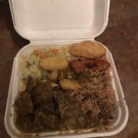 Curry Goat · Goat meat simmered in flavorful curry. Served with your choice of 2 side items, plantain and...