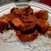 Murg Vindaloo · Chicken marinated with chili vinegar stewed with potatoes - from southern India, spicy. Serv...