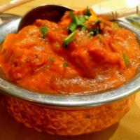 Kadai Paneer Makhani · Homemade cheese cooked with bell peppers, onions, tomatoes and freshly ground spices in an a...