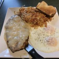 Chicken Fried Steak · Seasoned and hand breaded beef cutlet topped with our country gravy.