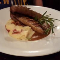 Bangers and Mash · House made British bangers, with garlic mashed and rich beef dripping gravy.