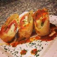 Pizza Eggrolls · The grown up version of your favorite after school snack. Pepperoni and fiesta blend cheese,...