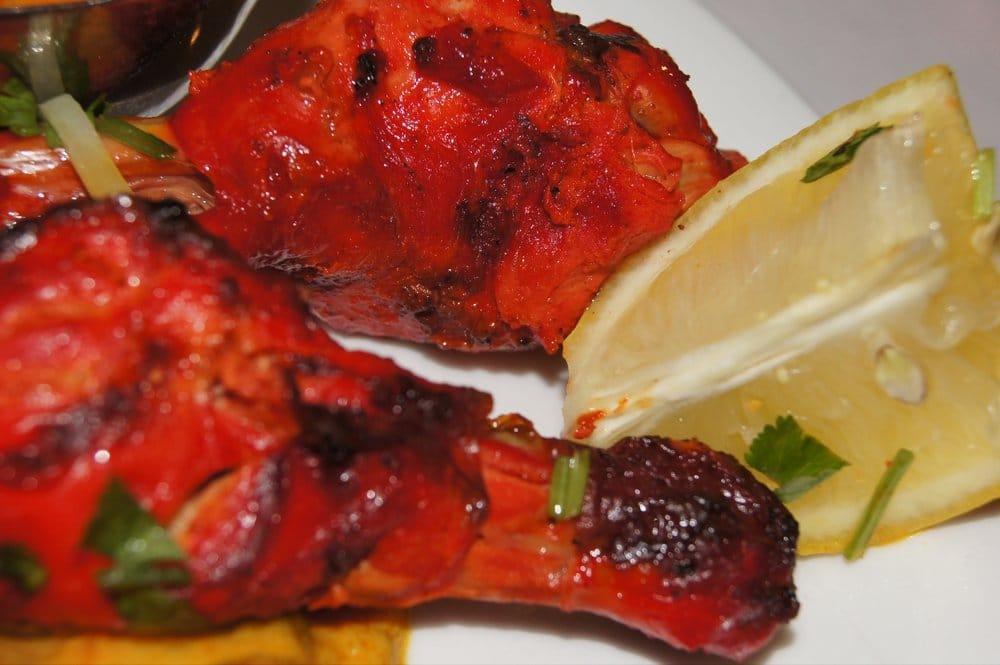 Tandoori Chicken · Tender pieces of chicken (legs) marinated in our special blend of homemade yogurt and Indian spice marinade.