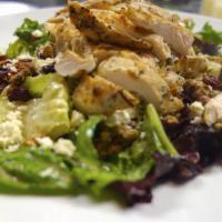 Chopped Salad · Grilled chicken breast, mixed greens, romaine, dried cranberries, feta cheese, candied walnu...