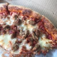 Meat Lovers Pizza · Pepperoni, bacon, fresh sliced ham, Italian sausage and ground beef.