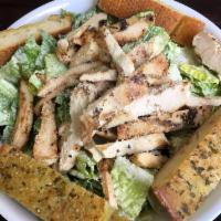Grilled Chicken Caesar · romaine lettuce w creamy ceasar dressing parmesan cheese grill chicken breast and garlic bread