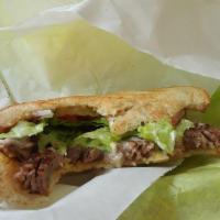 Hot Roast Beef · All sandwiches served with mustard, mayonnaise, lettuce, tomatoes, and pickle red onions, un...