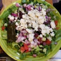 Greek Salad · Romaine lettuce, feta cheese, Kalamata olives, tomato, cucumbers, oregano and red onions. Ve...