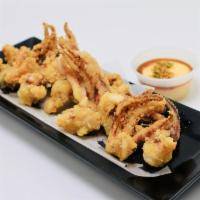 Geso Karaage · 7pcs of deep fried squid, comes with pineapple aioli sauce.