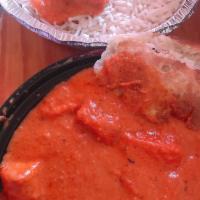 Chicken Tikka Masala · Boneless marinated chicken, grilled and sauteed in a creamy tomato and onion sauce.