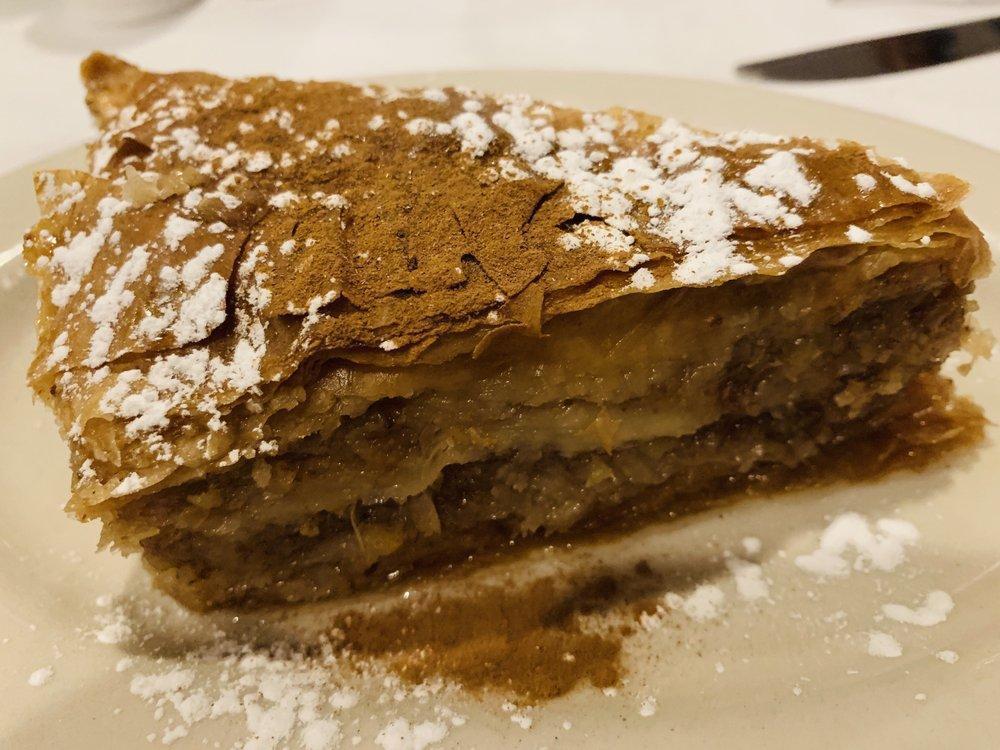 Baklava · Fourty layers of paper-thin phyllo sheers, with a filling of walnuts and cinnamon; baked and then steeped in a honey syrup.