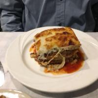 Pastichio · Baked layers of pasta, ground beef, tomato sauce, spices, and topped with bechamel.