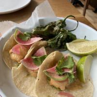 Fish Tacos · beer battered cod, smashed avocado, chipotle aioli, cilantro, pickled onions