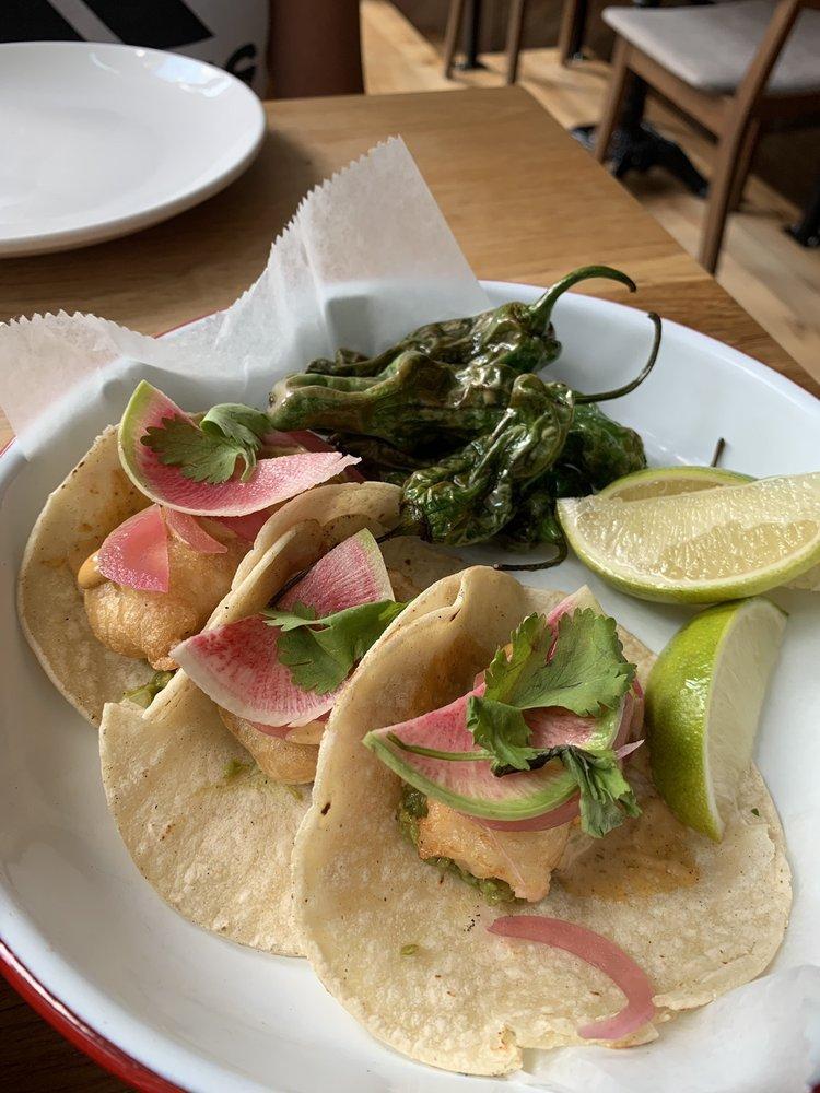 Fish Tacos · beer battered cod, smashed avocado, chipotle aioli, cilantro, pickled onions