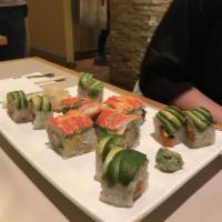 Amanda Roll · Shrimp tempura, avocado, cucumber inside topped with kani and spicy mayo. Cooked.