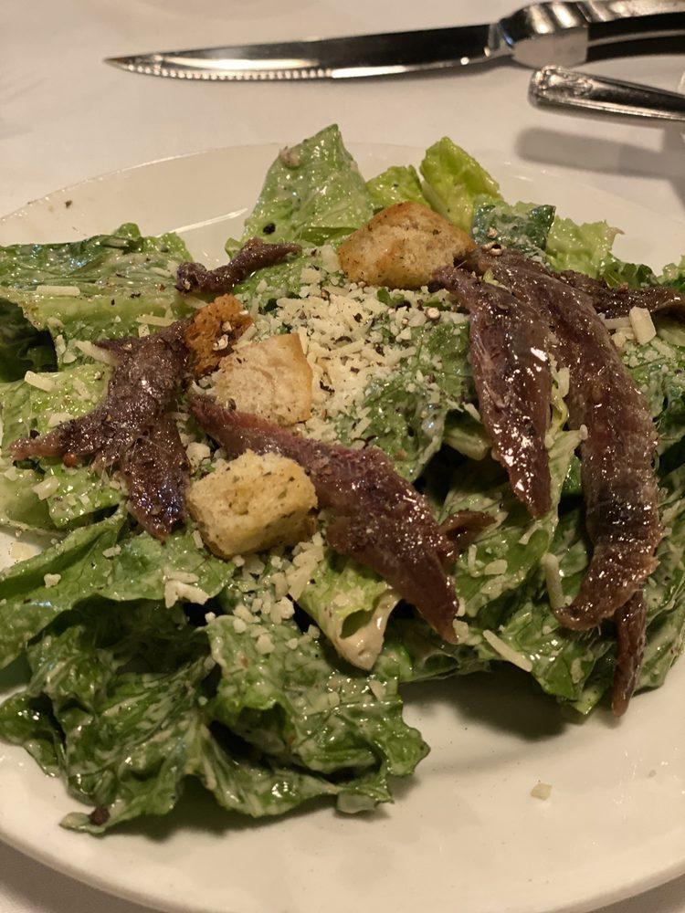 Caesar Salad · Green salad with Caesar dressing and cheese. 