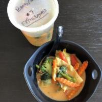 Panang Curry · Panang curry paste, coconut milk, bell pepper and kaffir lime leaves.