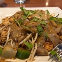 Drunken Noodles · Spicy noodle. Spicy pan fried flat rice noodles with garlic, Thai chili, bell pepper, bean s...