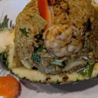 Pineapple Fried Rice · Fried rice with combination of chicken, shrimp, pineapple, cashew nuts, onions, scallions an...