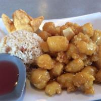 Orange Chicken · Battered chicken tossed with house sauce cooked orange sauce. Served with choice of rice.