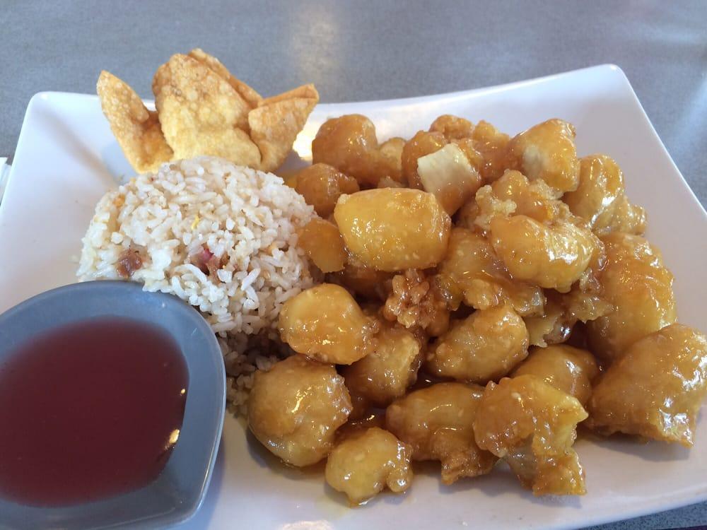 Orange Chicken · Battered chicken tossed with house sauce cooked orange sauce. Served with choice of rice.