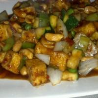 Kung Pao Tofu · Lightly battered tofu deep-fried then stir-fried with peanuts, chili peppers, peas, carrots,...