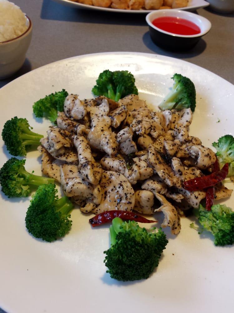 Black Pepper Chicken · Chicken stir-fried in hot oil with black pepper and fresh curry leaves that release a deliciously South East Asia nutty aroma and served with steamed broccoli. Includes your choice of rice.