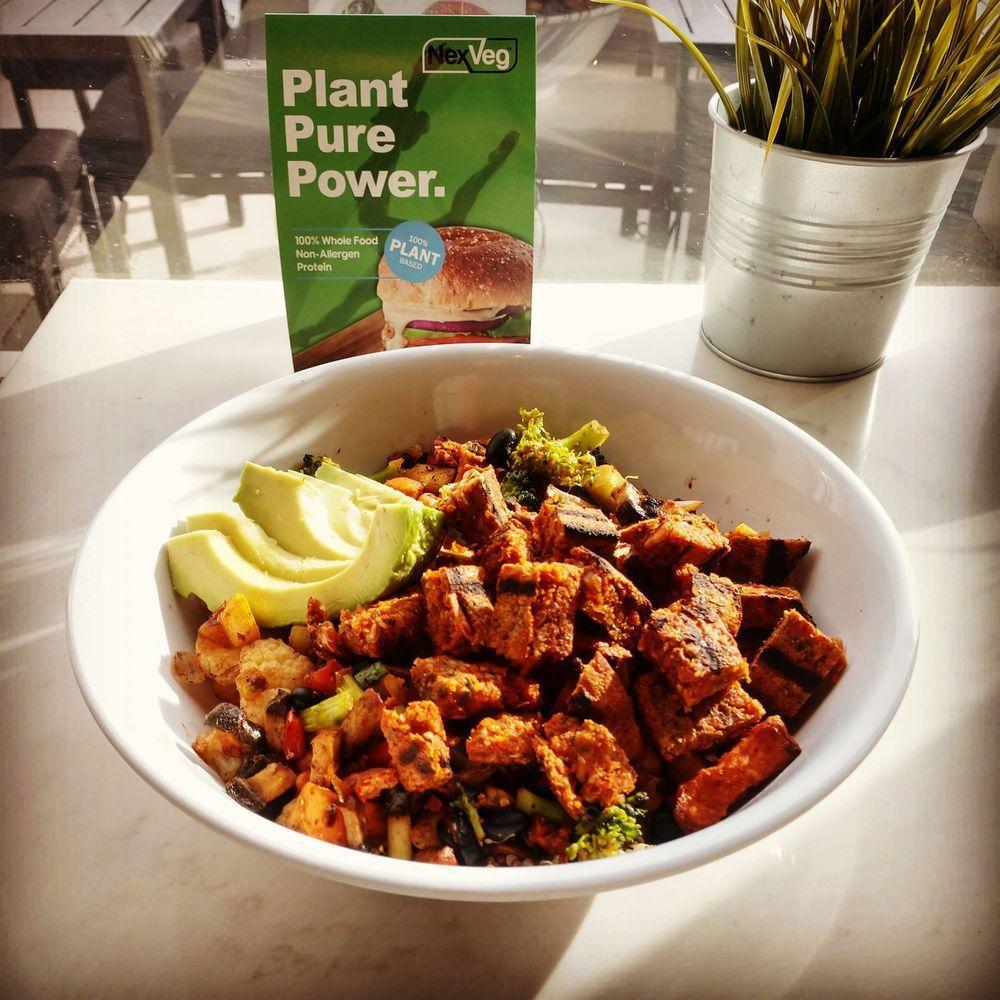 Plant Power Bowl · Organic non-GMO tofu, grilled portobello mushroom, quinoa, chopped garlic, sweet potatoes, squash, red onion, red peppers, broccoli, cauliflower, black beans chickpeas, sriracha, red pepper flakes.