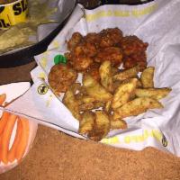 Kid's Boneless Wings · Served with your choice of veggies, fruit or all natural-cut french fries, and milk or soft ...