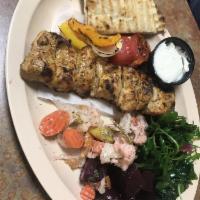 Chicken Kabob · Served with rice, house salad and pita.