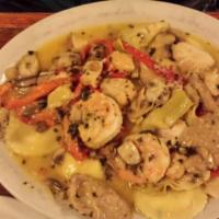 Sister Stephanie · Chicken, veal, and shrimp, roasted red peppers, artichoke hearts, mushroom, basil, garlic wi...
