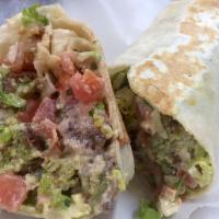 Falafel Burrito · Served with pico de gallo, lettuce and our delicious tangy sauce.