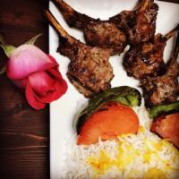 Lamb Chops · Grilled Tender Lamb Chops
Served with basmati rice, grilled tomatoes and green peppers.
