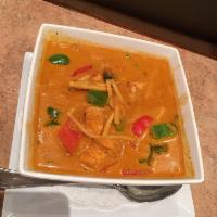 Red Curry · Choice of meat with bamboo shoot, basil, bell peppers, and red curry paste in coconut milk. ...