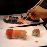 Rainbow Roll · Albacore, shrimp, salmon, tuna, white fish on top of California roll. 8 pieces
