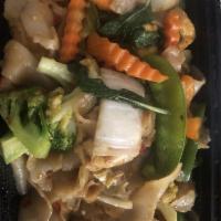 Drunken Noodle · Stir fried with wide rice noodles and sweet basil leaves, onion and  bell pepper in chili an...