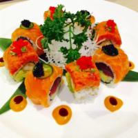 Godzilla Roll · Shrimp tempura and avocado topped with spicy tuna, scallion, caviar and spicy sauce.
