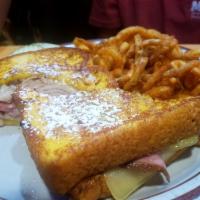 Blueberry Hill Style Monte Cristo Sandwich · Turkey and ham smothered with Swiss cheese, grilled on our own French toast bread. Not deep-...
