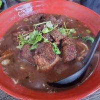 Taiwanese Beef Noodle Soup · Taiwanese noodles, braised beef, bok choy, cilantro, scallions and in a homemade spiced beef...