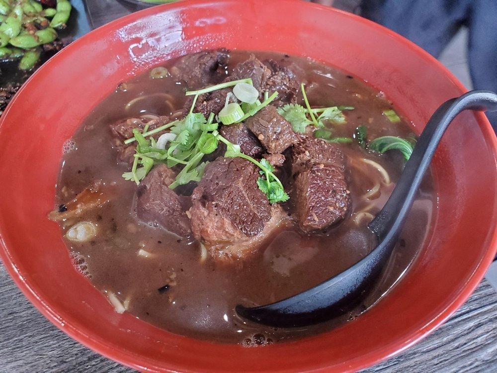 Taiwanese Beef Noodle Soup · Taiwanese noodles, braised beef, bok choy, cilantro, scallions and in a homemade spiced beef broth.