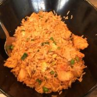 Kimchi Fried Rice · Blend of steamed riced stir-fried with kimchi, gochujang sauce, egg, onions, scallions, peas...