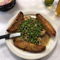 Chicken Vesuvio · Boneless chicken breast, white wine garlic, peas and potatoes.