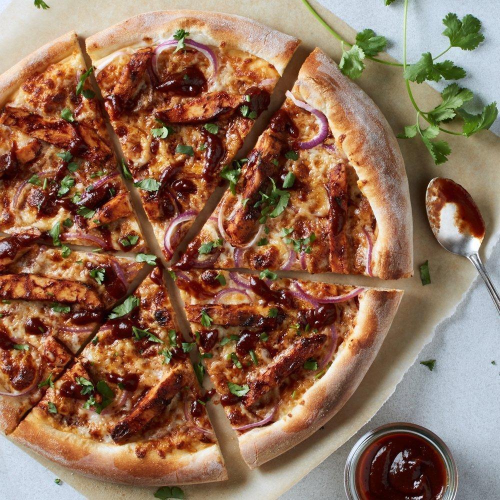 The Original BBQ Chicken Pizza · Our legendary BBQ sauce, smoked Gouda, red onions and fresh cilantro transform this original to iconic.