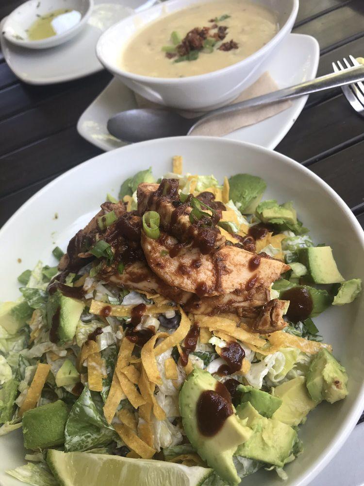 The Original BBQ Chicken Chopped Salad · Black beans, sweet corn, jicama, fresh cilantro and basil, crispy corn tortilla strips, Monterey Jack and our housemade herb ranch. Topped with BBQ chicken, tomatoes and scallions.
