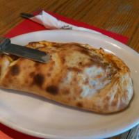 Calzone · Onions, mushrooms, pepperoni, salami and black olives. Includes cheese and sauce.