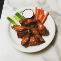 Buffalo Wings · Served with celery and carrots.