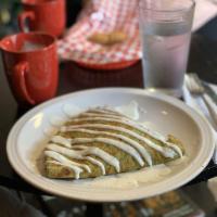 Green Eggs and Ham Crepe · Our special green crepe with eggs, ham and choice of cheese.